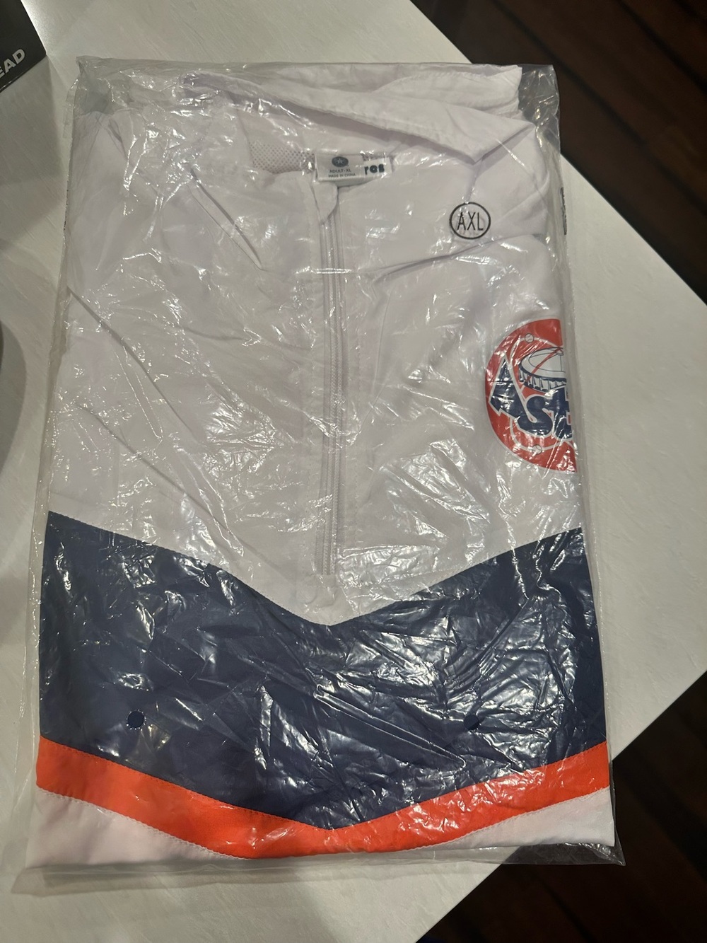 Men's White Windbreaker with Navy Chevron and Orange Accent